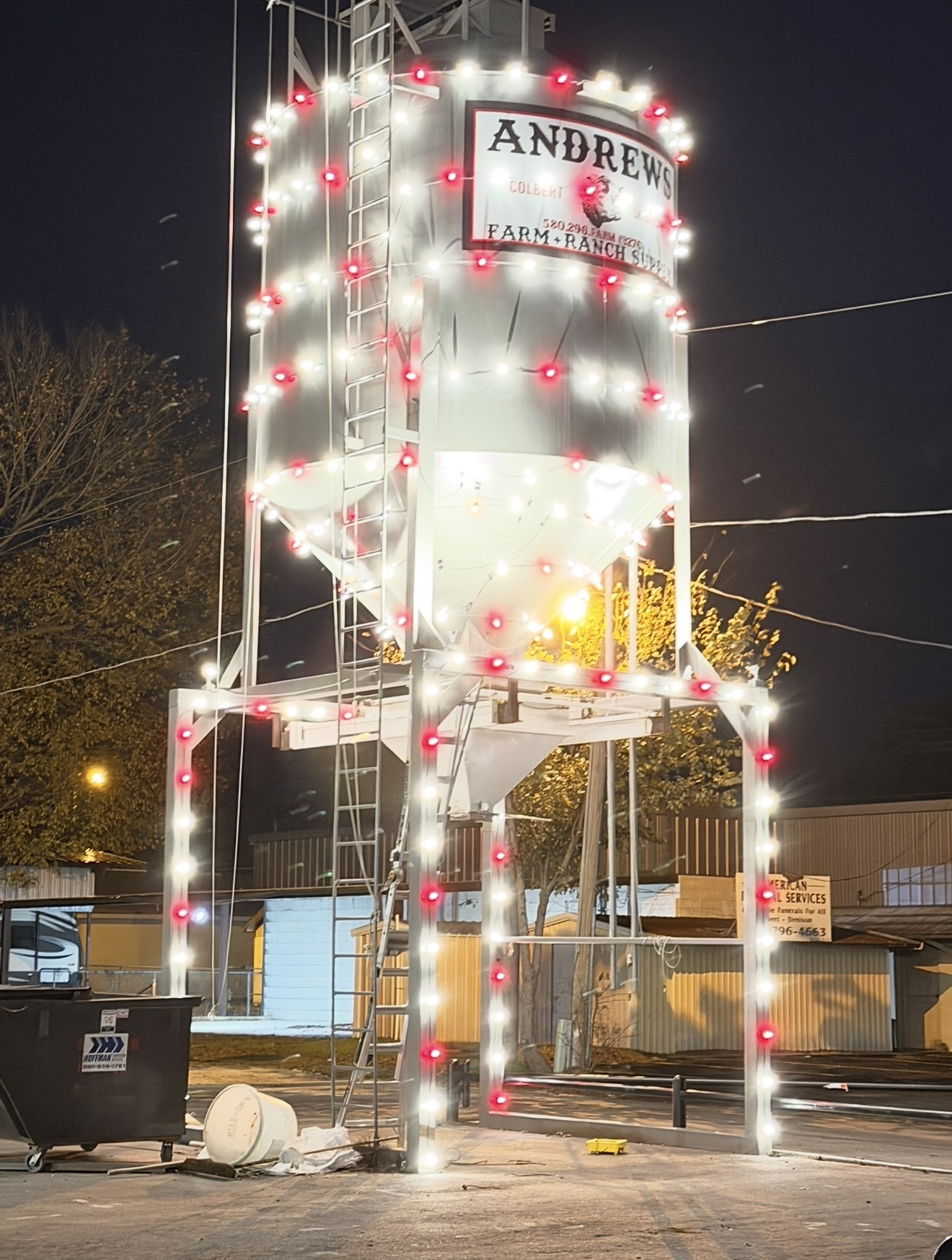 Commercial C9 LED Christmas light install on grain silo